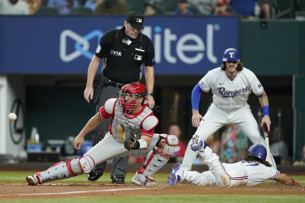 Texas Rangers' Leody Taveras follows through on an RBI single during the  fourth inning of the team's baseball game against the Atlanta Braves,  Wednesday, May 17, 2023, in Arlington, Texas. (AP Photo/Tony