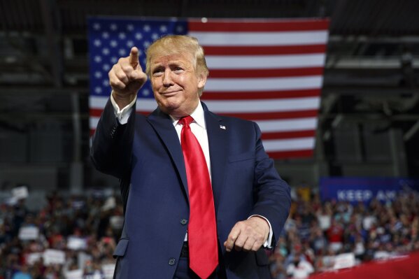 FILE - In this Wednesday, July 17, 2019 file photo, President Donald Trump gestures to the crowd as he arrives to speak at a campaign rally at Williams Arena in Greenville, N.C. Former President Donald Trump repeated false claims that the election was stolen from him 10 times during interviews this week on Fox News Channel, Newsmax and One America News Networks. The claims were unprompted but also unchallenged in each case. (AP Photo/Carolyn Kaster, File)