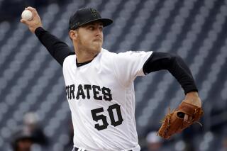 FILE - In this April 25, 2019, file photo, Pittsburgh Pirates starting pitcher Jameson Taillon delivers during the first inning of a baseball game against the Arizona Diamondbacks in Pittsburgh. A person familiar with the trade talks tells The Associated Press the New York Yankees made the second addition to their starting rotation of the offseason, agreeing to acquire right-hander Taillon from the Pirates for four prospects. (AP Photo/Gene J. Puskar, File)