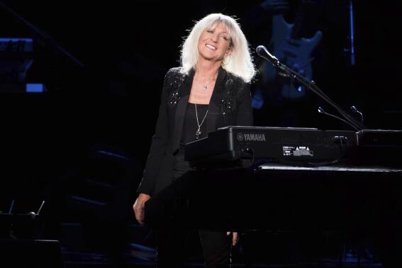 FILE - Christine McVie from the band Fleetwood Mac performs at Madison Square Garden in New York on Oct. 6, 2014. McVie, the soulful British musician who sang lead on many of Fleetwood Mac’s biggest hits, has died at 79. The band announced her death on social media Wednesday. (Photo by Charles Sykes/Invision/AP, File)