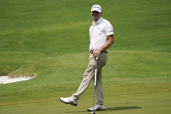 Lucas Glover reacts to a missed birdie putt on the seventh green during the second round of the St. Jude Championship golf tournament Friday, Aug. 11, 2023, in Memphis, Tenn. (AP Photo/George Walker IV)