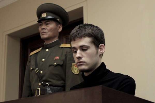 FILE - Matthew Miller, a U.S. citizen, sits on the dock at the Supreme Court during his trial in Pyongyang, North Korea on Sept. 14, 2014. (AP Photo/Kim Kwang Hyon, File)