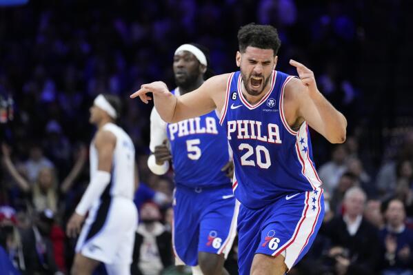 Philadelphia 76ers' Georges Niang, right, reacts after a basket during the second half of an NBA basketball game against the Orlando Magic, Wednesday, Feb. 1, 2023, in Philadelphia. (AP Photo/Matt Slocum)