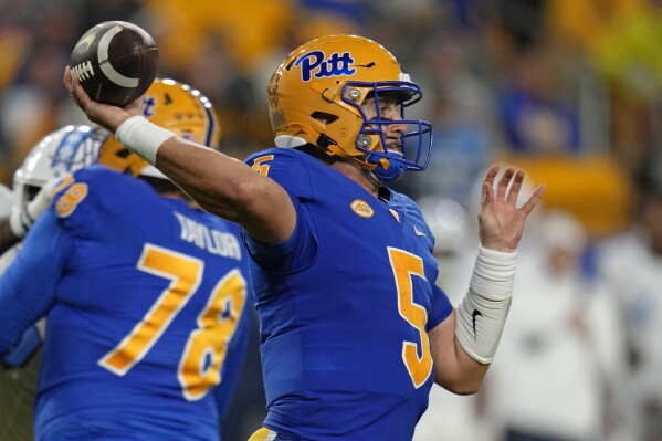 Pittsburgh quarterback Phil Jurkovec (5)looks to throw a pass during the first half of an NCAA college football game against North Carolina in Pittsburgh, Saturday, Sept. 23, 2023. (AP Photo/Gene J. Puskar)