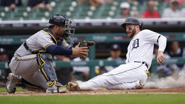 Martinez helps Tigers win in first start at catcher in two years