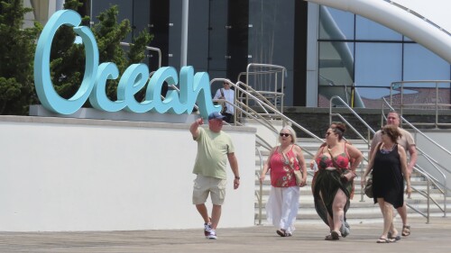 People walk past the Ocean Casino Resort in Atlantic City, N.J., on June 15, 2023. The city's two newest casinos - Hard Rock and Ocean - which both opened on June 27, 2018, have become the second and third most successful Atlantic City casinos in terms of money won from in-person gamblers. (AP Photo/Wayne Parry)