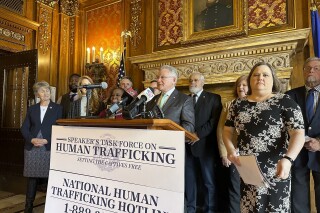 Wisconsin State Rep. Jerry O'Connor introduces a package of legislation to combat human trafficking during a news conference Wednesday, Jan. 10, 2024 in the state Capitol in Madison, Wis. as members of the state Assembly's human trafficking task force look on (AP Photo/Todd Richmond)