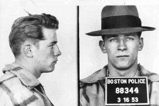 
              FILE - These 1953 file Boston police booking photos provided by The Boston Globe shows James "Whitey" Bulger after an arrest. Officials with the Federal Bureau of Prisons said Bulger died Tuesday, Oct. 30, 2018, in a West Virginia prison after being sentenced in 2013 in Boston to spend the rest of his life in prison. (Boston Police/The Boston Globe via AP)
            