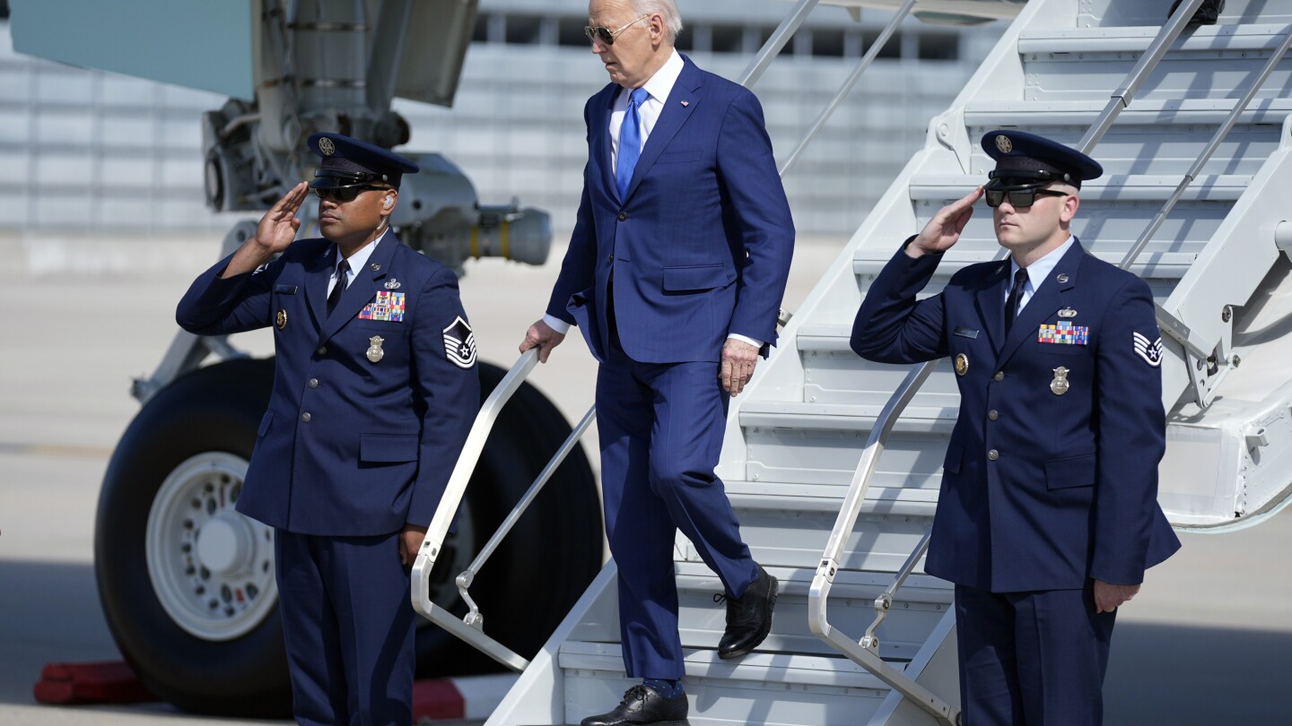 President Joe Biden arrives at Chicago O'Hare International Airport to attend a political fundraiser, Wednesday, May 8, 2024, in Chicago. (AP Photo/Evan Vucci)