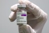 FILE - Medical staff prepares an AstraZeneca coronavirus vaccine during preparations at the vaccine center in Ebersberg near Munich, Germany, Monday, March 22, 2021. The pharma giant AstraZeneca has requested that its European authorization for its COVID vaccine be pulled, according to the EU medicines regulator on Wednesday, May 8, 2024. (AP Photo/Matthias Schrader, FILE)