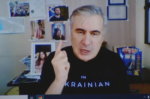 In this photo taken from video, Georgia's jailed ex-President Mikheil Saakashvili appears on a screen via a video link from a prison during a court hearing in Tbilisi, Georgia, on Monday, March 17, 2025. (TV formula via AP)