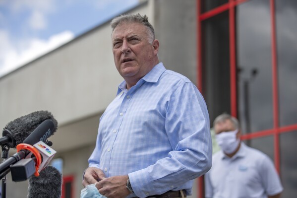Georgia Insurance and Safety Fire Commissioner John King makes a statement and answers questions from the media following a tour of Fieldale Farms while visiting Gainesville, Ga., Friday, May 15, 2020. (Alyssa Pointer/Atlanta Journal-Constitution via AP, file)