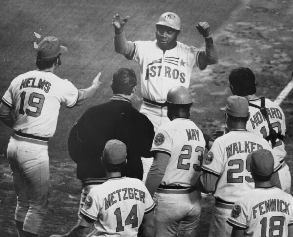 FILE - In this 1972 file photo, Houston Astros' Jimmy Wynn, top, is greeted at the plate after a home run in a baseball game in Houston. Wynn, the slugger who earned his nickname of “The Toy Cannon” during his days with the Astros in the 1960s and '70s, has died. Wynn was 78. The Astros said he died on Thursday, March 26, 2020, in Houston, but did not provide further details. (Blair Pittman/Houston Chronicle via AP)