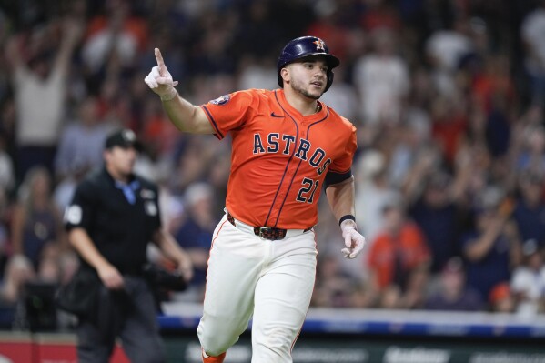 Houston Astros' Yainer Diaz reacts after hitting the game-winning home run against the Tampa Bay Rays during the ninth inning of a baseball game Friday, May 30, 2025, in Houston. (AP Photo/Eric Christian Smith)