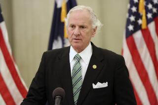 In this Aug. 9, 2021, photo, South Carolina Gov. Henry McMaster talks about the current state of the COVID-19 pandemic at a news conference in Columbia, S.C. The ACLU, representing parents of children with disabilities and disability rights groups, filed a federal lawsuit Tuesday, Aug. 24, 2021 against a South Carolina law that bans school districts from imposing mask mandates, arguing that the ban effectively excludes vulnerable students from public schools. Gov. McMaster has said parents should have the choice of whether or not children should wear masks in schools. (AP Photo/Jeffrey Collins, file)