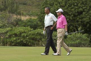 FILE - President Barack Obama plays golf with Malaysian Prime Minister Najib Razak, right, Dec. 24, 2014, on the Marine Corps Base Hawaii's Kaneohe Klipper Golf Course in Kaneohe, Hawaii during the Obama family vacation. Najib Razak on Tuesday, Aug. 23, 2022 was Malaysia’s first former prime minister to go to prison -- a mighty fall for a veteran British-educated politician whose father and uncle were the country’s second and third prime ministers, respectively. The 1MDB financial scandal that brought him down was not just a personal blow but shook the stranglehold his United Malays National Organization party had over Malaysian politics. (AP Photo/Jacquelyn Martin, file)