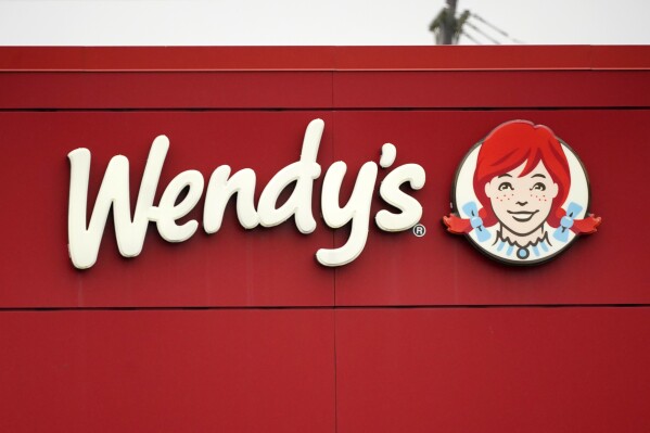 FILE - The Wendy's sign is seen at a restaurant, Jan. 23, 2023, in Pittsburgh. On Thursday, Jan. 18, 2024, Wendy’s Co. named Kirk Tanner, a longtime PepsiCo executive, as its new CEO. (AP Photo/Gene J. Puskar, File)