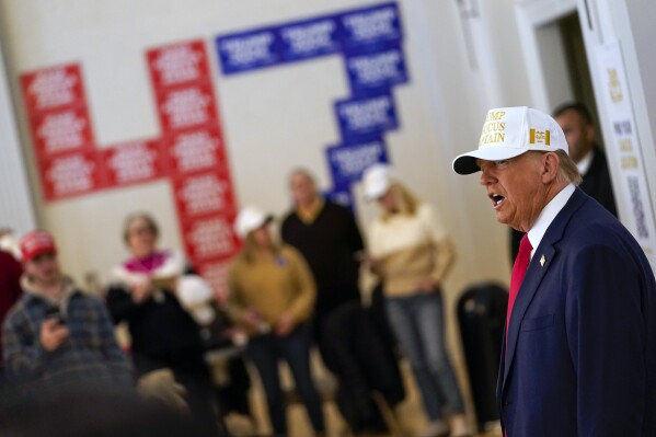 Republican presidential candidate former President Donald Trump speaks to volunteers at Hotel Fort Des Moines in Des Moines, Iowa, Sunday, Jan. 14, 2024. (AP Photo/Andrew Harnik)