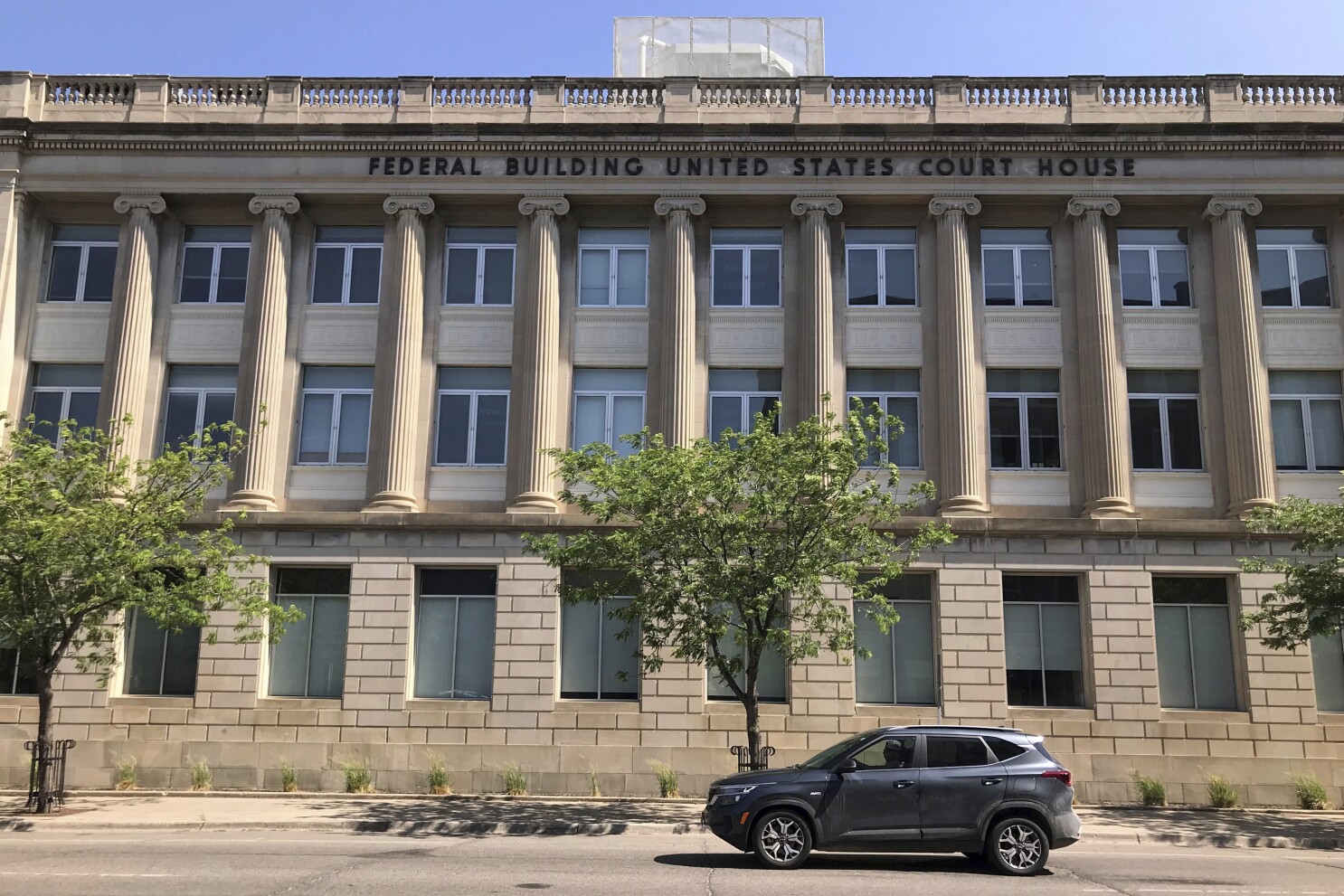 Judge bars agencies from punishing Catholic groups over trans rights views