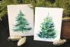 This image provided by Judy A. Steiner shows handmade watercolor Christmas tree cards. Handmade holiday cards can be gifts in themselves for both maker and receiver. They're a way to express creativity and connection. And gathering to make them can be a nice social activity. (Judy A. Steiner via AP)
