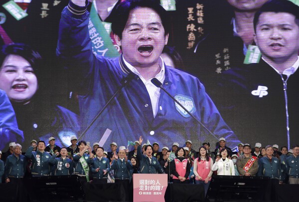 Taiwan Vice President and Democratic Progressive Party presidential candidate William Lai, center, delivers a speech during an election campaign in New Taipei City, Taiwan, Saturday, Jan. 6, 2024. (AP Photo/Chiang Ying-ying, File)