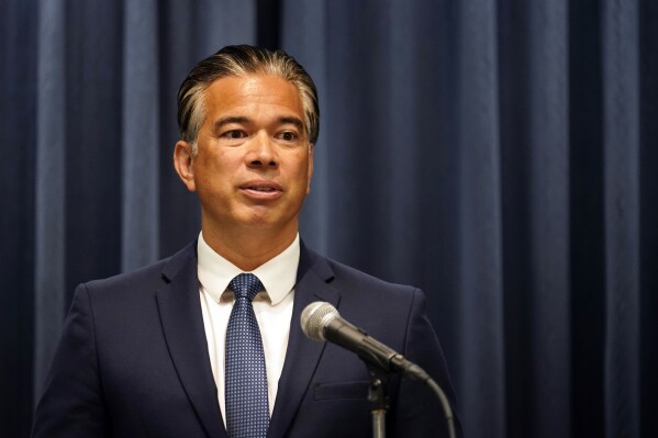 FILE - California Attorney General Rob Bonta fields questions during a press conference on Aug. 28, 2023, in Los Angeles. A state appeals court ruled on Nov. 17, 2023, that the Department of Justice can share gun owners' personal information with researchers to study gun violence, overturning a lower court's decision that temporary halted the data sharing last year. (AP Photo/Marcio Jose Sanchez, File)