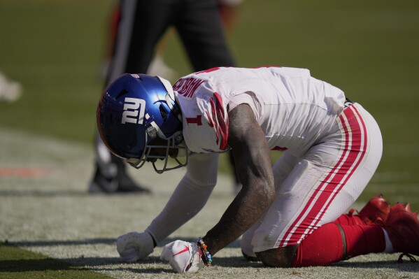 Losing kicker Graham Gano to injury hamstrings the Giants in their loss at  Washington | AP News