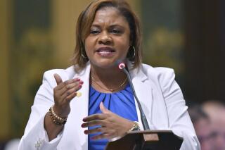FILE - Michigan state Rep. Leslie Love, D-Detroit, speaks at the state Capitol in Lansing, Mich., July 12, 2017. The former state representative, a Democrat who represented Detroit for six years in the Michigan Legislature, announced Monday, May 15, 2023, that she would seek the state's open U.S. Senate seat in 2024. (Dale G Young/Detroit News via AP, File)