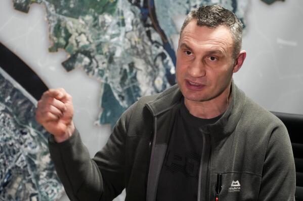 Vitali Klitschko, Kyiv Mayor and former heavyweight champion gestures while speaking during his interview with the Associated Press in his office in the City Hall in Kyiv, Ukraine, Sunday, Feb. 27, 2022. A Ukrainian official says street fighting has broken out in Ukraine's second-largest city of Kharkiv. Russian troops also put increasing pressure on strategic ports in the country's south following a wave of attacks on airfields and fuel facilities elsewhere that appeared to mark a new phase of Russia's invasion. (AP Photo/Efrem Lukatsky)