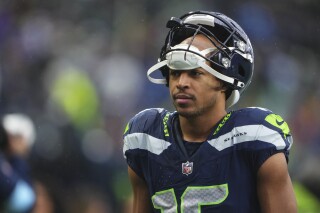 Seahawks release longtime wide receiver Tyler Lockett in cost-cutting move  | AP News