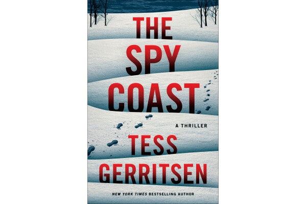 This cover image released by Thomas & Mercer shows "The Spy Coast" by Tess Gerritsen. (Thomas & Mercer via AP)
