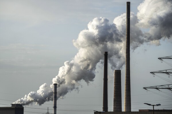 Steam rises from Schwelgern coking plant, which is in operation for German steel producer thyssenkrupp Steel Europe in Duisburg, Germany, Wednesday, Oct. 11, 2023. The producer — whose emissions in 2022 rivaled those of some oil and gas majors, according to data they reported to non-profit CDP — sent four people with three different delegations to COP27. (AP Photo/Martin Meissner)