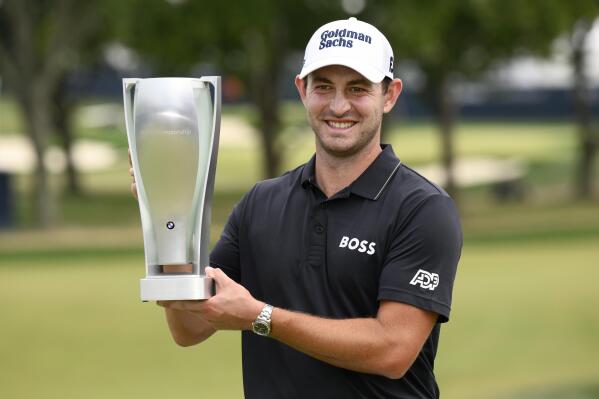 Patrick Cantlay celebrates after winning the BMW Championship golf tournament at Wilmington Country Club, Sunday, Aug. 21, 2022, in Wilmington, Del. (AP Photo/Nick Wass)