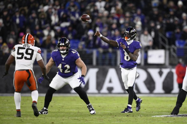 Ravens QB Jackson, the first member of the 4,000-900 club, looks toward  playoff run | AP News