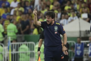 Brazil's coach Fernando Diniz reacts during a qualifying soccer match for the FIFA World Cup 2026 against Argentina at Maracana stadium in Rio de Janeiro, Brazil, Tuesday, Nov. 21, 2023. (AP Photo/Bruna Prado)