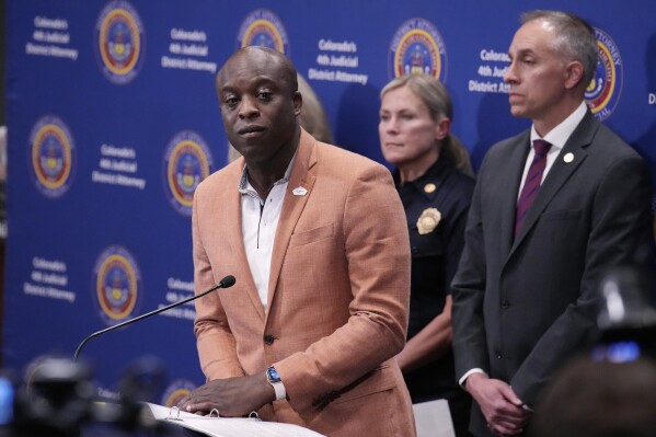 Colorado Springs, Colo., Mayor Yemi Mobolade considers a question during a news conference after a hearing for the suspect in a mass shooting at a gay nightclub Monday, June 26, 2023, in Colorado Springs, Colo. (AP Photo/David Zalubowski, file)