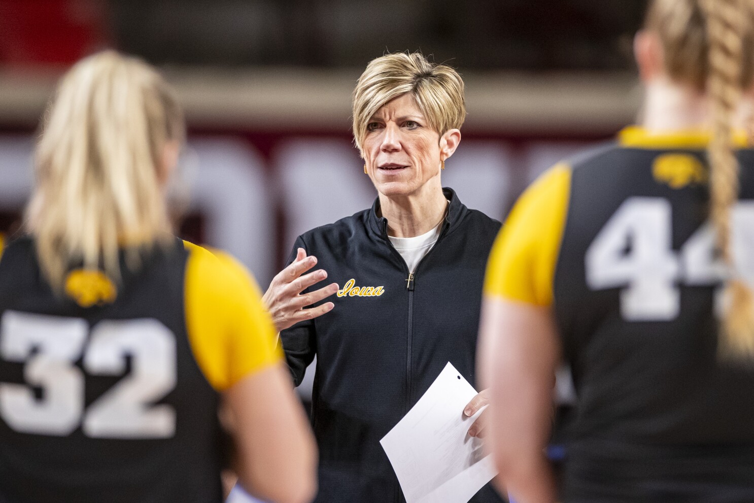 Jan Jensen leads Iowa into NCAA Tournament as head coach after 24 years as a Hawkeyes assistant | AP News