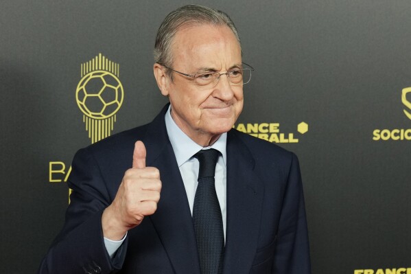 FILE - Real Madrid president Florentino Perez poses for a picture prior the 66th Ballon d'Or ceremony at Theatre du Chatelet in Paris, France, Monday, Oct. 17, 2022. The European Union’s top court has ruled UEFA and FIFA acted contrary to EU competition law by blocking plans for the breakaway Super League. The case was heard last year at the Court of Justice after Super League failed at launch in April 2021. UEFA President Aleksander Ceferin called the club leaders “snakes” and “liars.” (AP Photo/Francois Mori, File)