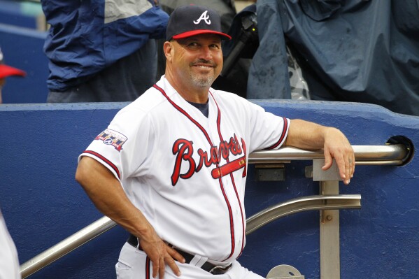 Atlanta Braves manager Fredi Gonzalez (33) smiles in the dugout prior to a baseball game against the Philadelphia Phillies, Thursday, May 12, 2016, in Atlanta. (AP Photo/Brett Davis,File)
