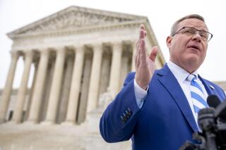 FILE - North Carolina House Speaker Tim Moore speaks in front of the Supreme Court in Washington, Dec. 7, 2022. North Carolina legislators repealed on Wednesday, March 29, 2023, the state’s requirement that someone obtain a permit from a local sheriff before buying a pistol, as the Republican-controlled legislature overrode successfully one of Democratic Gov. Roy Cooper’s vetoes for the first time since 2018. (AP Photo/Andrew Harnik, File)