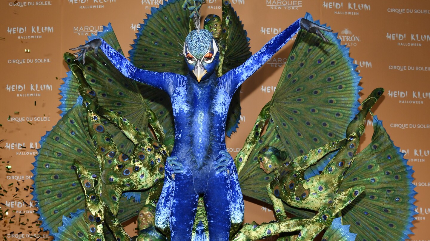 Heidi Klum’s Stunning Peacock Halloween Costume Captured in Photos