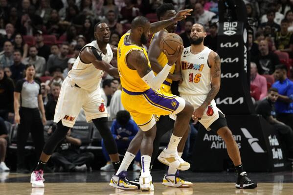 Heat get past Lakers 112-98, climb over .500 at 18-17