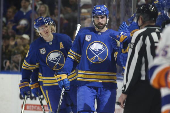 Buffalo Sabres right wing Alex Tuch (89) is congratulated after scoring against the New York Islanders during the second period of an NHL hockey game Thursday, Jan. 19, 2023, in Buffalo, N.Y. (AP Photo/Joshua Bessex)