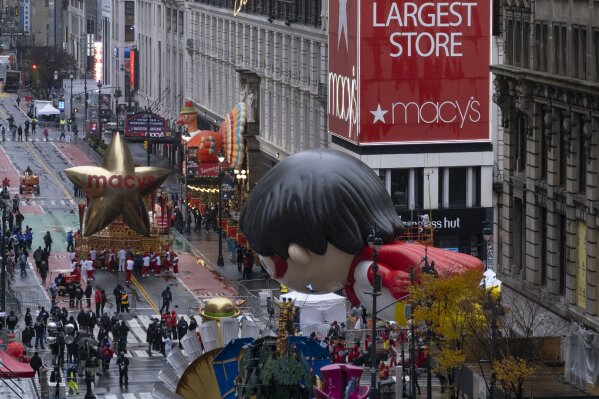 Floats that are part of the modified Macy's Thanksgiving Day Parade are seen from the Empire State Building in New York, Thursday, Nov. 26, 2020. Due to the pandemic, no crowds of onlookers were allowed to attend the annual parade. (AP Photo/Craig Ruttle)