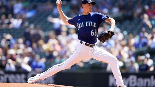 Seattle Mariners starting pitcher George Kirby throws against the Minnesota Twins during the first inning of a baseball game, Thursday, July 20, 2023, in Seattle. (AP Photo/Lindsey Wasson)