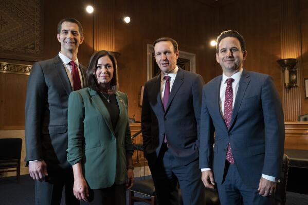 From left, Sen. Tom Cotton, R-Ark., Sen. Katie Britt, R-Ala., Sen. Christopher Murphy, D-Conn., and Sen. Brian Schatz, D-Hawaii, who have introduced legislation to protect kids on social media, pose for a portrait after being interviewed by the Associated Press, Wednesday, May 3, 2023, on Capitol Hill in Washington. (AP Photo/Jacquelyn Martin)