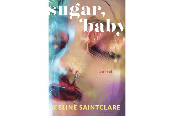 This cover image released by Bloomsbury shows "Sugar, Baby" by Celine Saintclare. (Bloomsbury via AP)