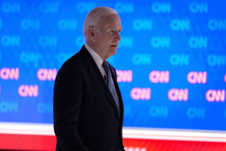 President Joe Biden walks off stage during the break of a presidential debate with Republican presidential candidate former President Donald Trump hosted by CNN, Thursday, June 27, 2024, in Atlanta. (AP Photo/Gerald Herbert)