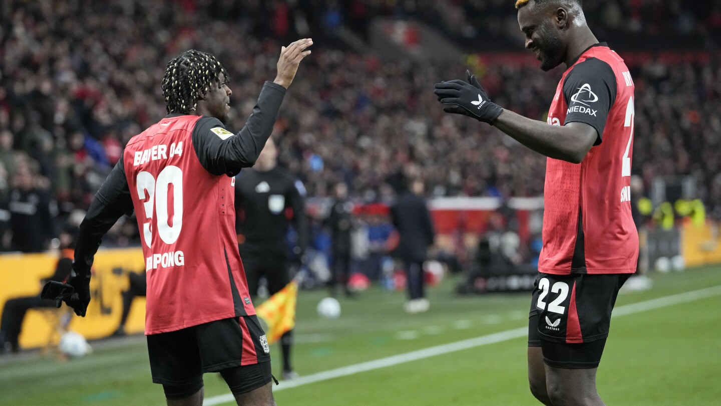 Leverkusen beats Hoffenheim 3-1, stays close to Bayern