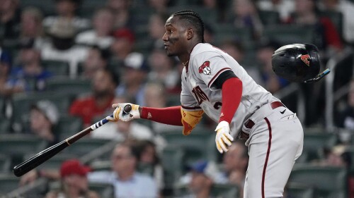 Arizona Diamondbacks' Geraldo Perdomo puts the Diamondbacks ahead with a two-run double in the ninth inning of a baseball game against the Atlanta Braves Tuesday, July 18, 2023, in Atlanta. (AP Photo/John Bazemore)